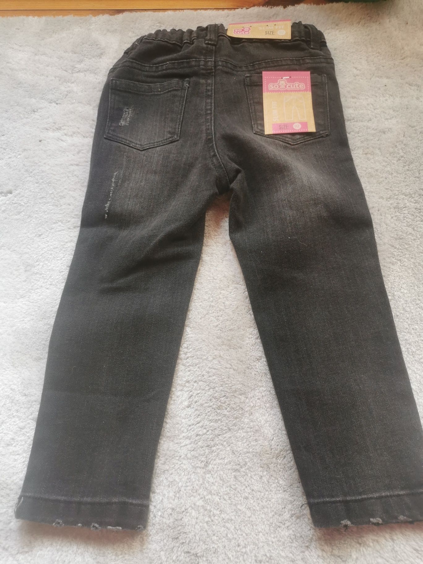 Nowe czarne jeansy 92