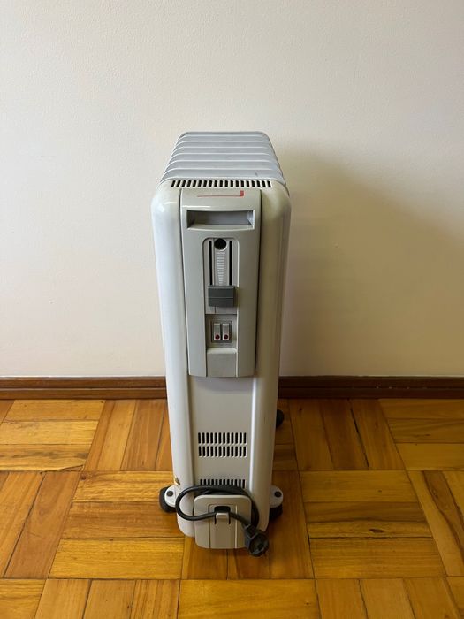 Aquecedor a óleo marca solar 1500w