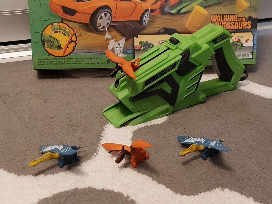 Pistolet, wyrzutnia auta i dinozaurów 2w1