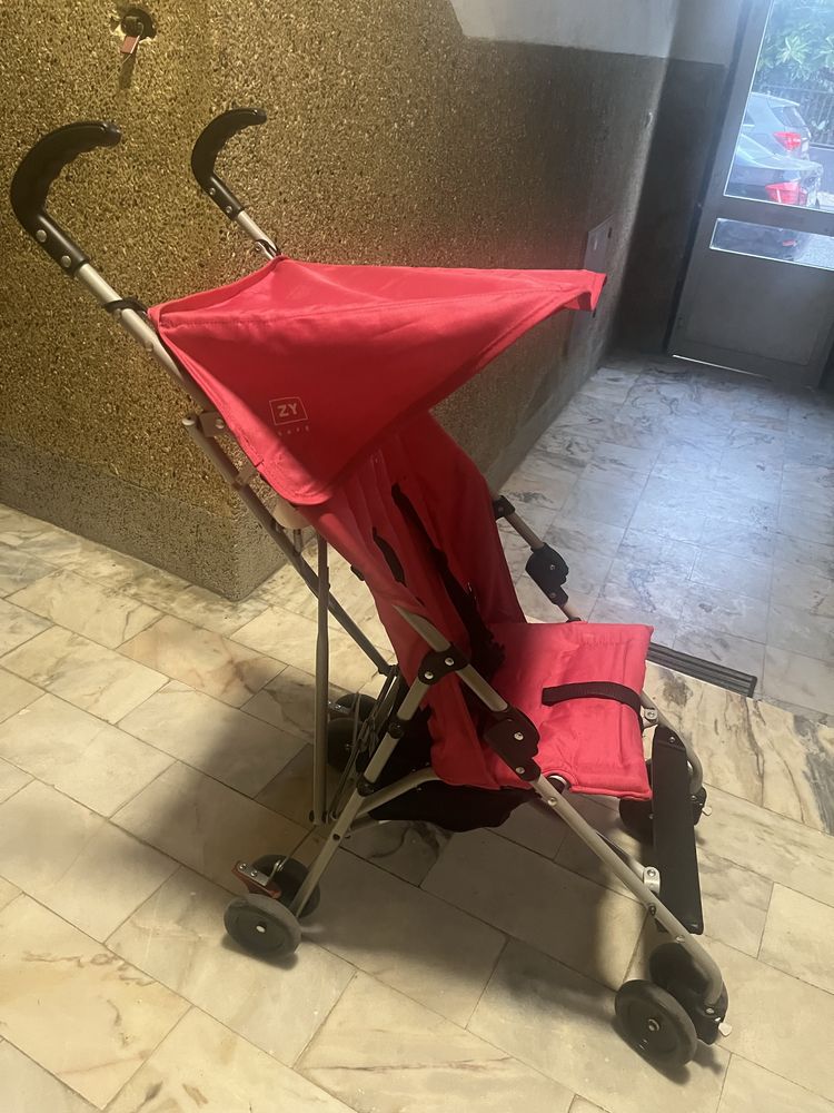 Carrinho bengala rosa com cobertura