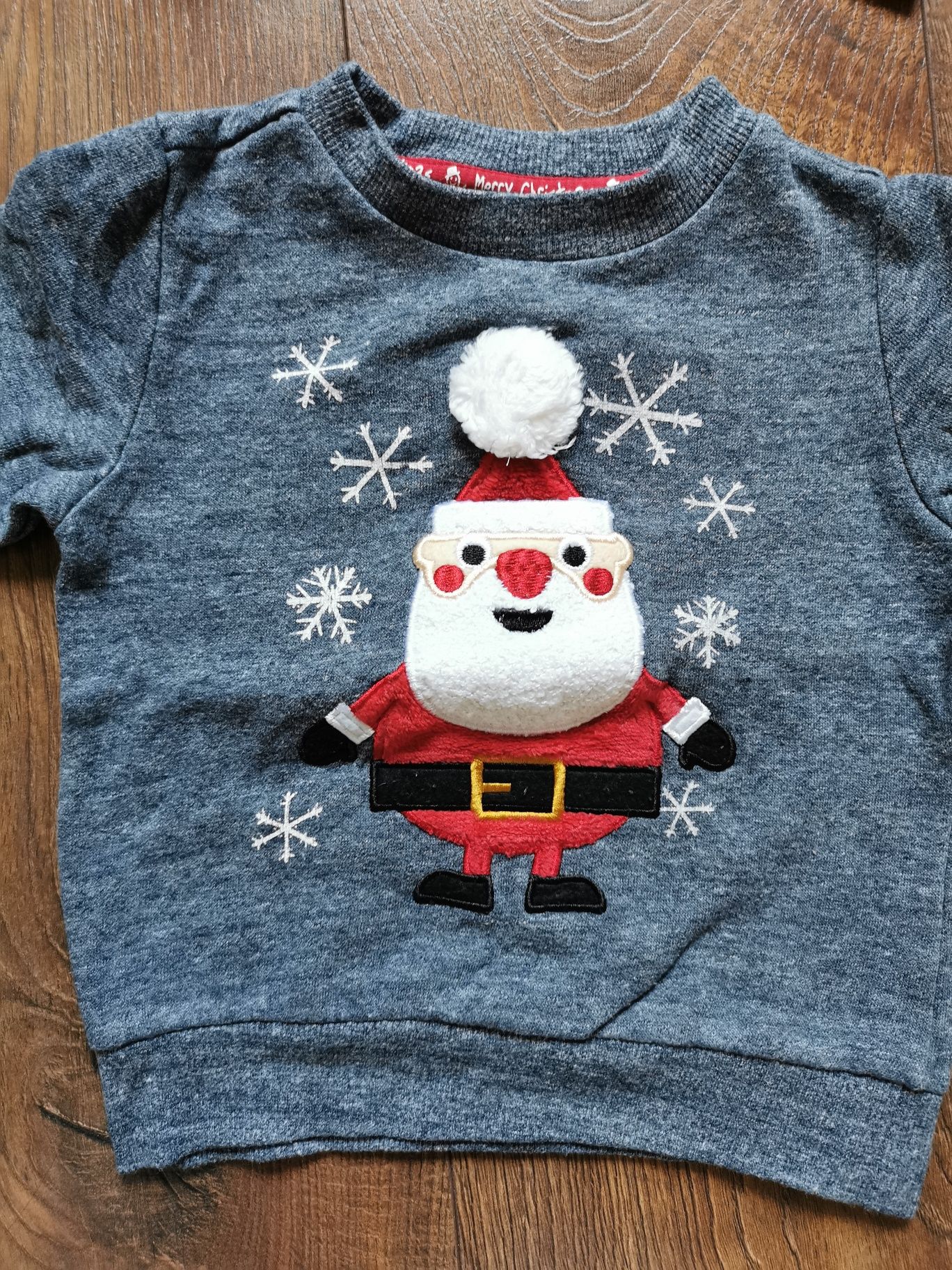 Bluzy, swetry świąteczne z Mikołajem