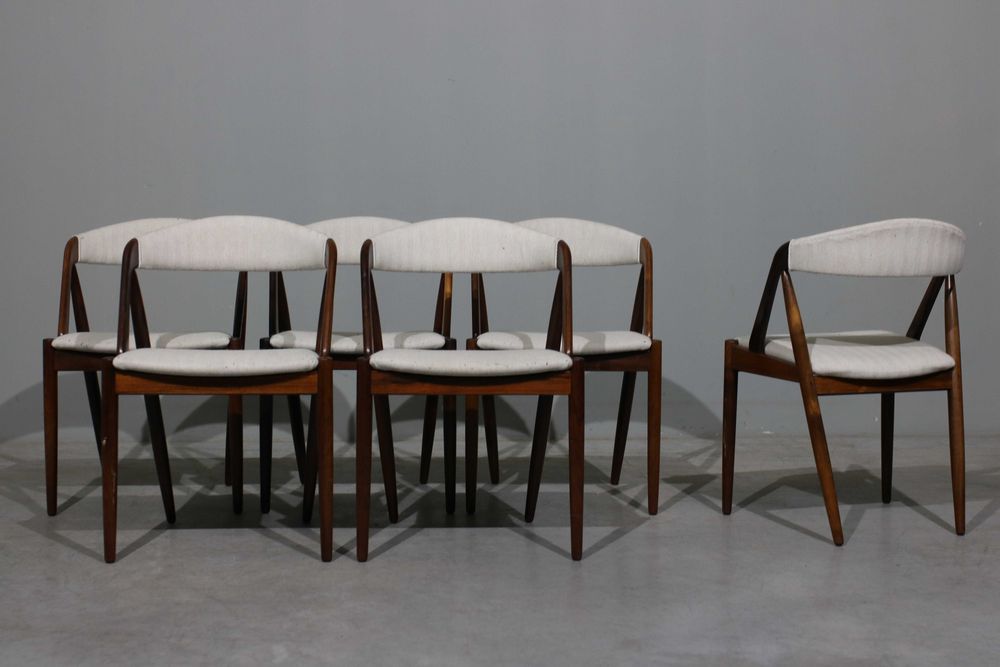 Cadeiras Kai Kristiansen modelo 31 em pau santo | Schou Andersen