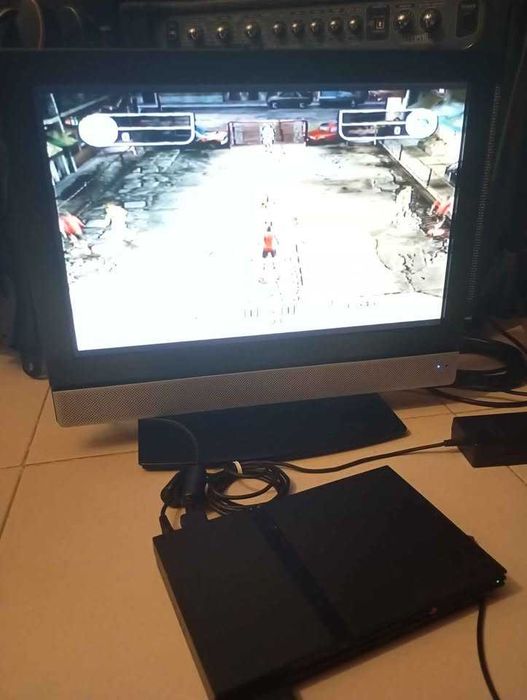 Ps2 Slim com fifa street e camara