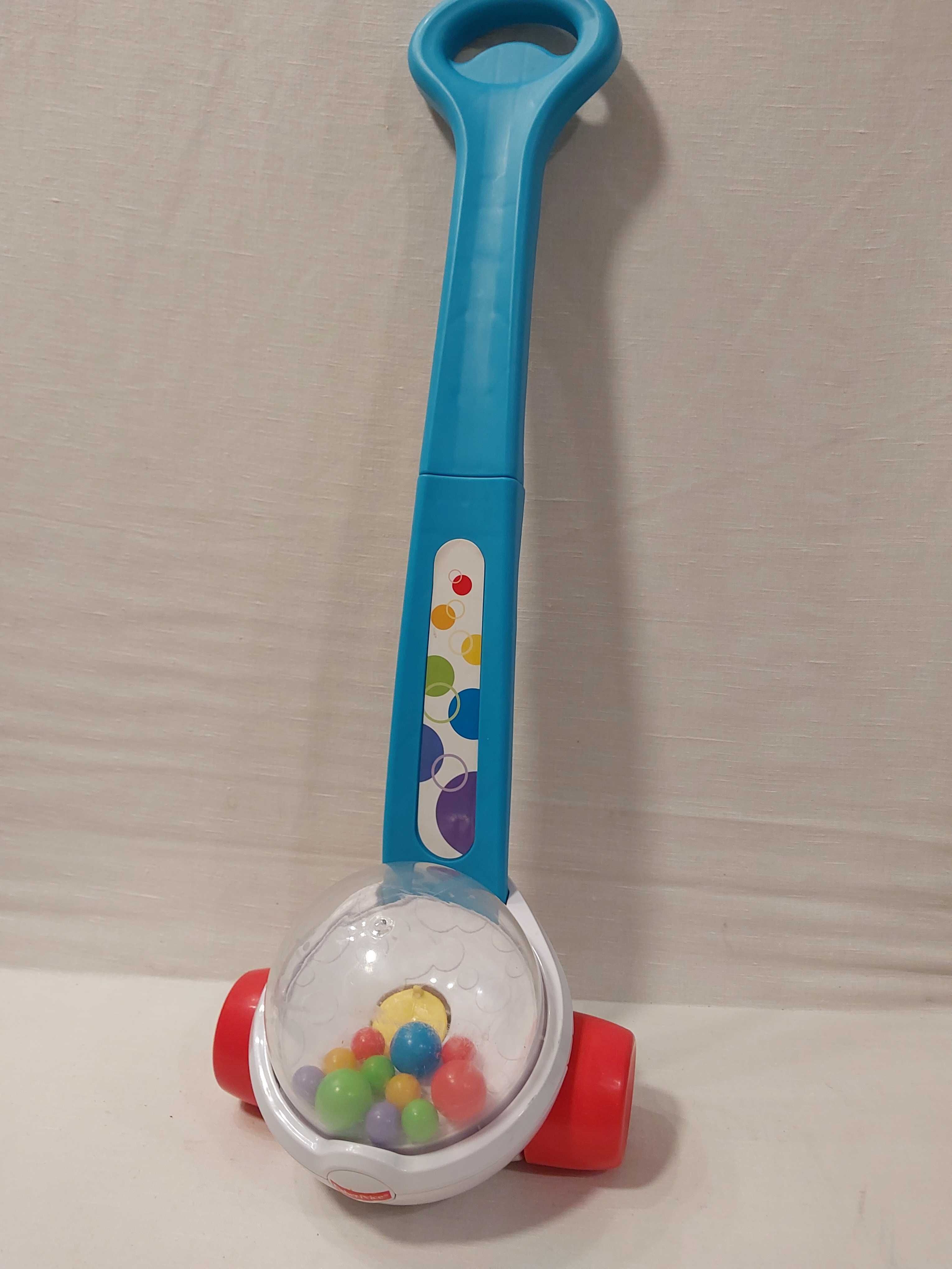 Fisher Price_Pchacz/ jeździk z podskakującymi kulkami