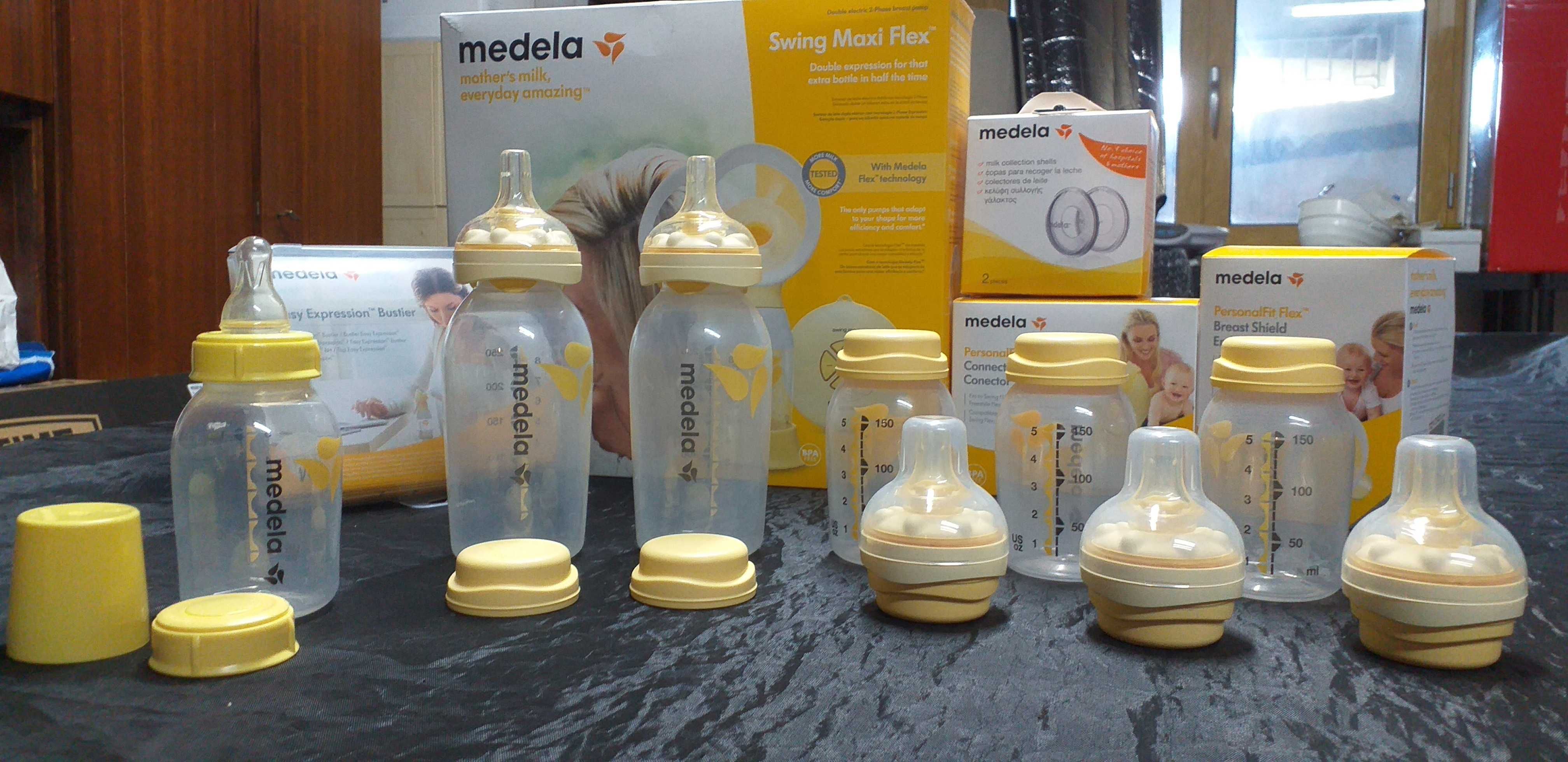 Vários biberões / frascos Medela 150ml e 250ml e tetinas Calma Medela