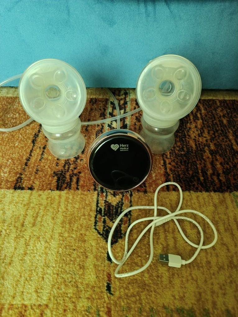 Laktator elektryczny podwójny Herz Medical+nakładki Medela