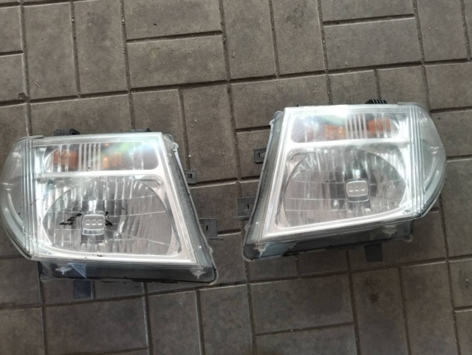 Фара передня Nissan X-Trail T31/Qashqai J10/Note/Pathfinder
