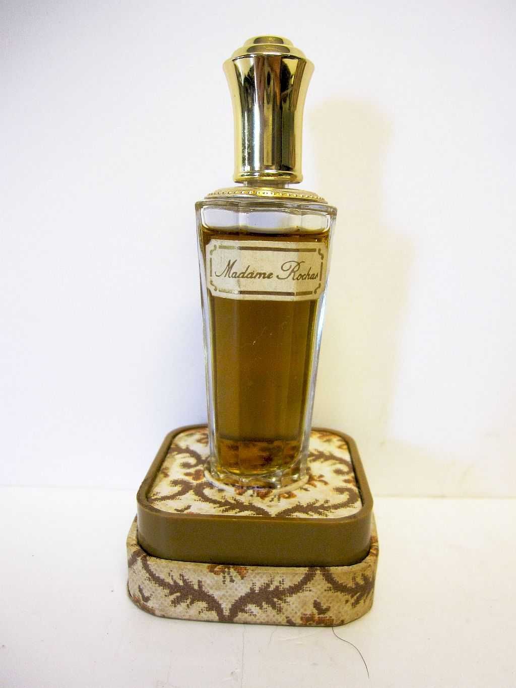 frasco de perfume francês vintage "Madame Rochas" com perfume