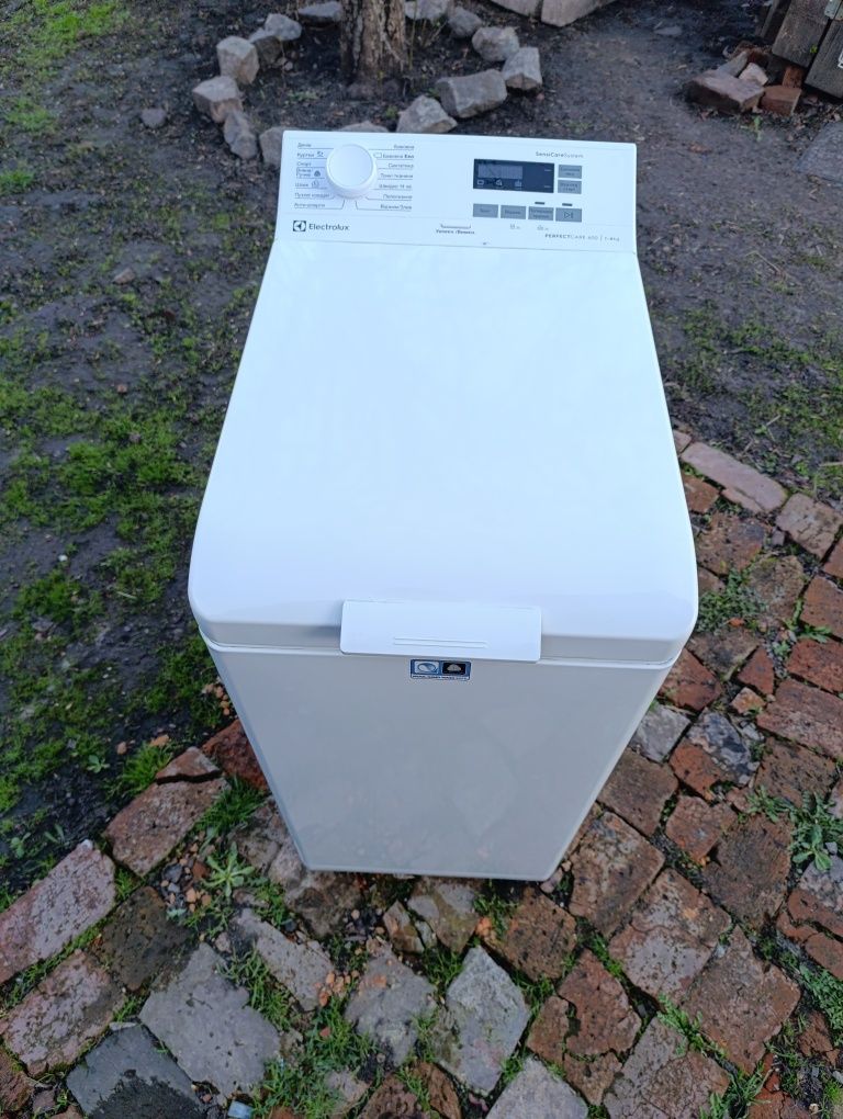 Стиральная машинка автомат вертикальная загрузка Electrolux EW6T5061U