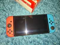 Nintendo switch oled z zestawem gier i akcesoriów