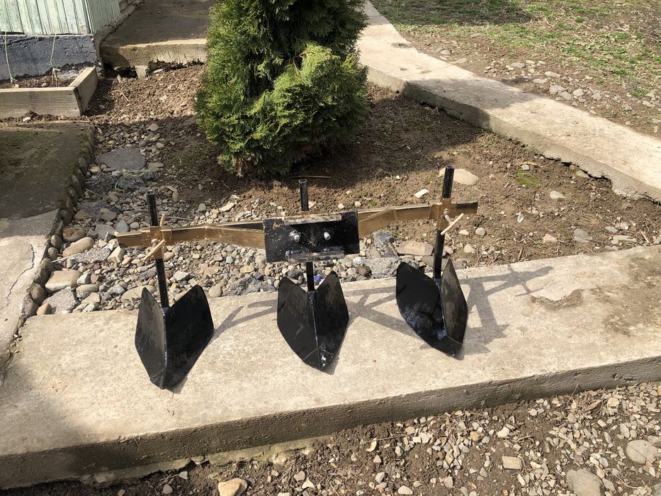 Плуги (марка) до мотоблока