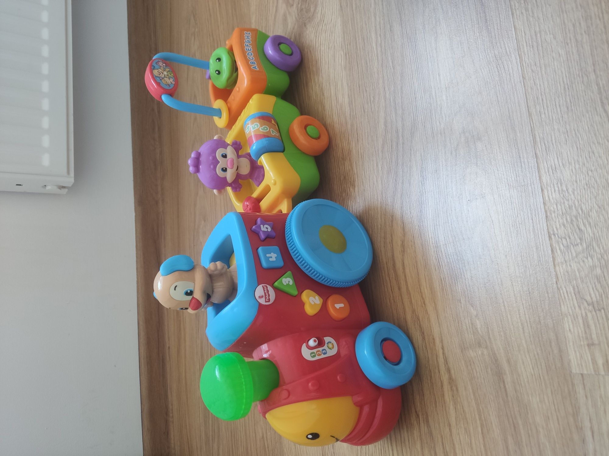 Pociąg szczeniaczka Fisher Price