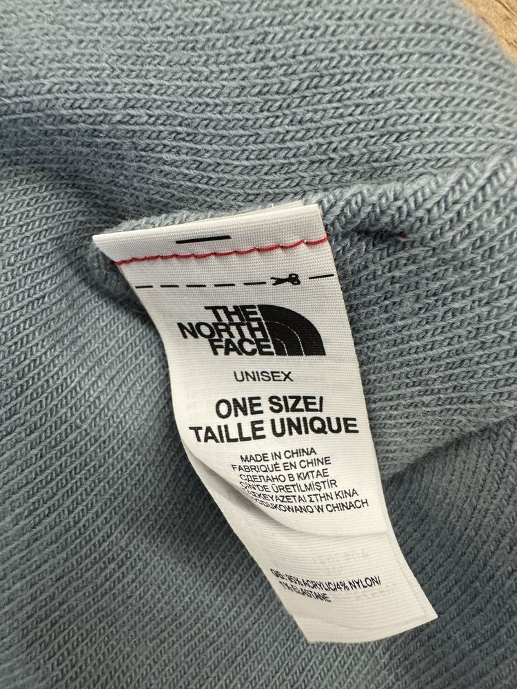 Двостороння чоловіча шапка бренду THE NORTH FACE
