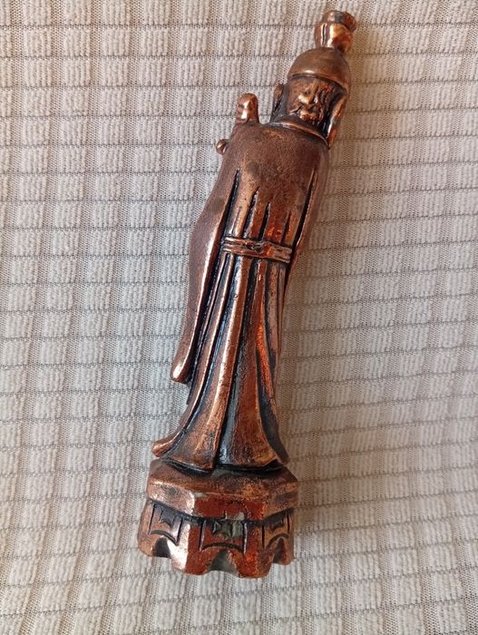 Figurka chińskiego mędrca.