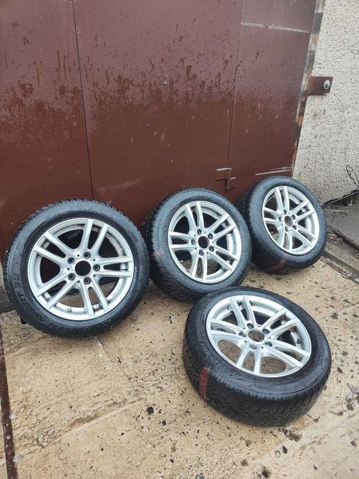 Продам комплект дисків  BMW із шинами Danlop 21 року