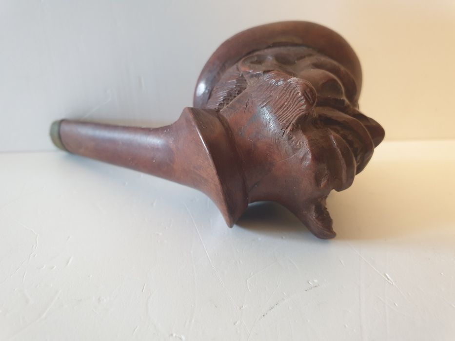 Antiga cabeça de um cachimbo americano -Farmers head
