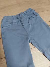 Spodnie jeansy 128 134 na gumie