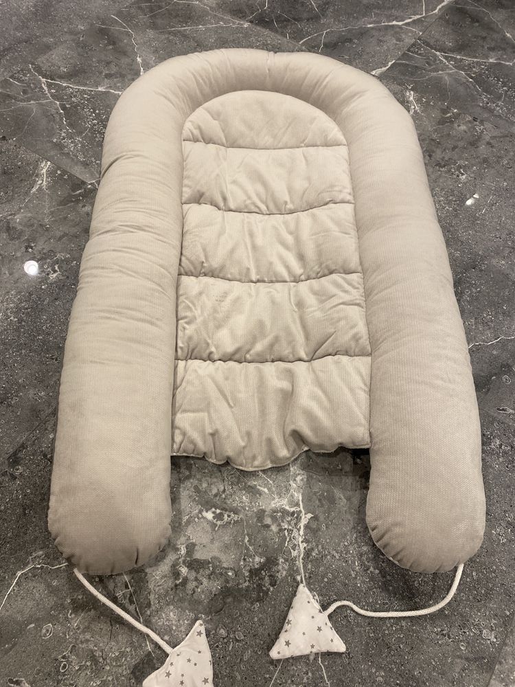 Dwustronny kokon poduszka dla dziecka