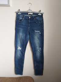 Spodnie jeansowe z rozdarciami Gina Tricot rozmiar M/38