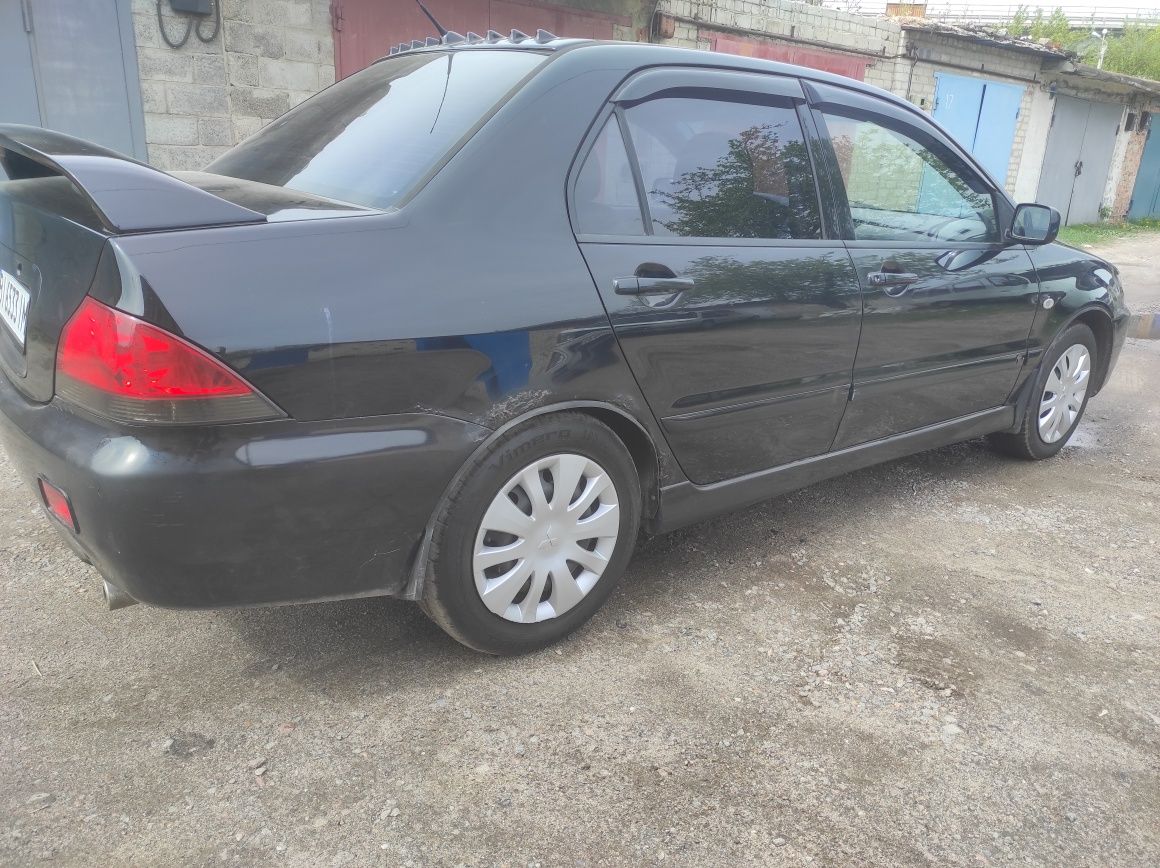 Лансер 9 1.6 газ 4 Lanser 2005 год Mitsubishi