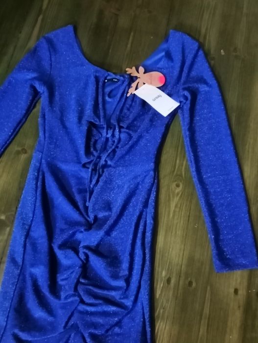 Блискуча мінісукня