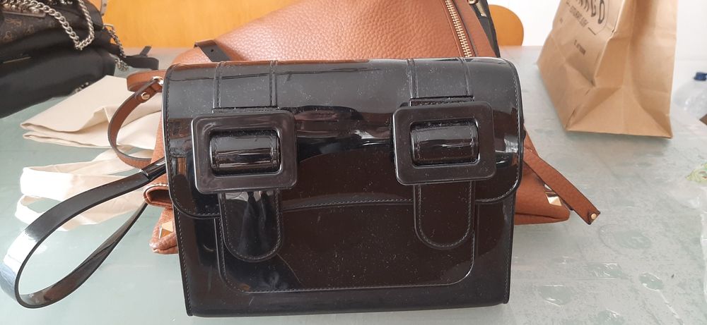 Carteiras e mochilas de marca original