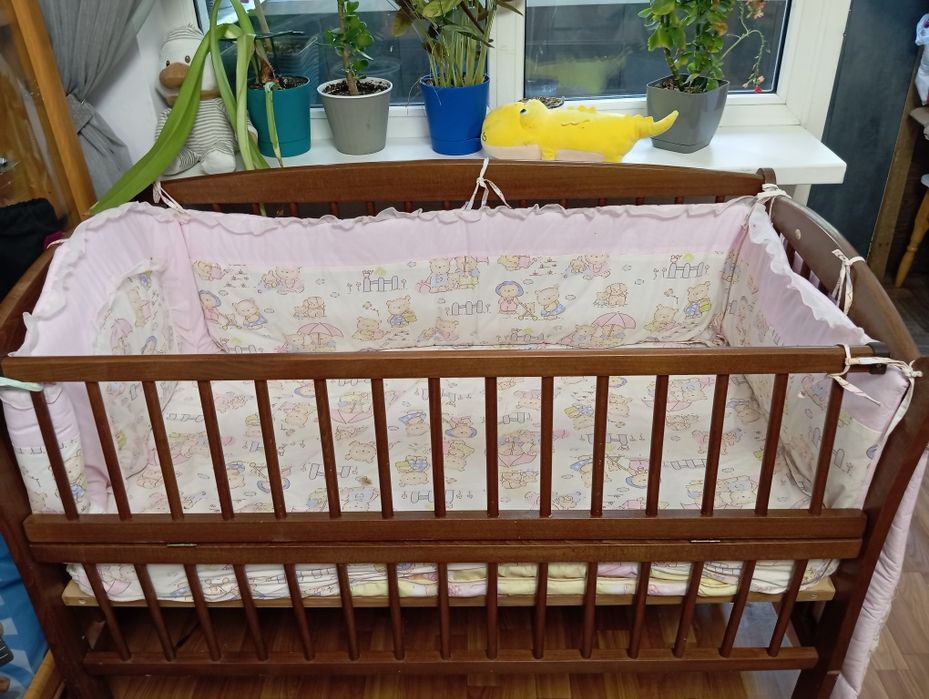 Дитяча кроватки з маятником та бортиками