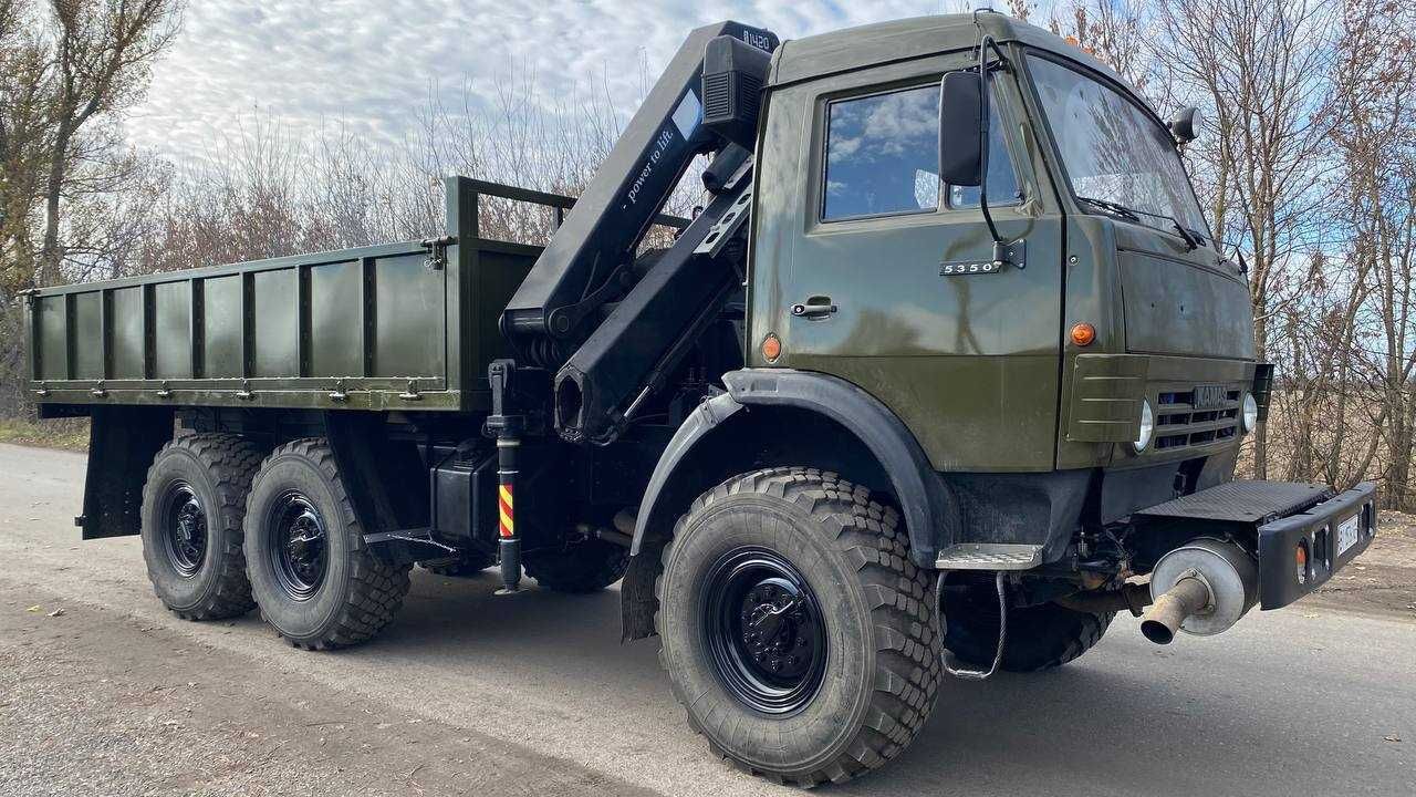 КАМАЗ 4310, бортовий з маніпулятором