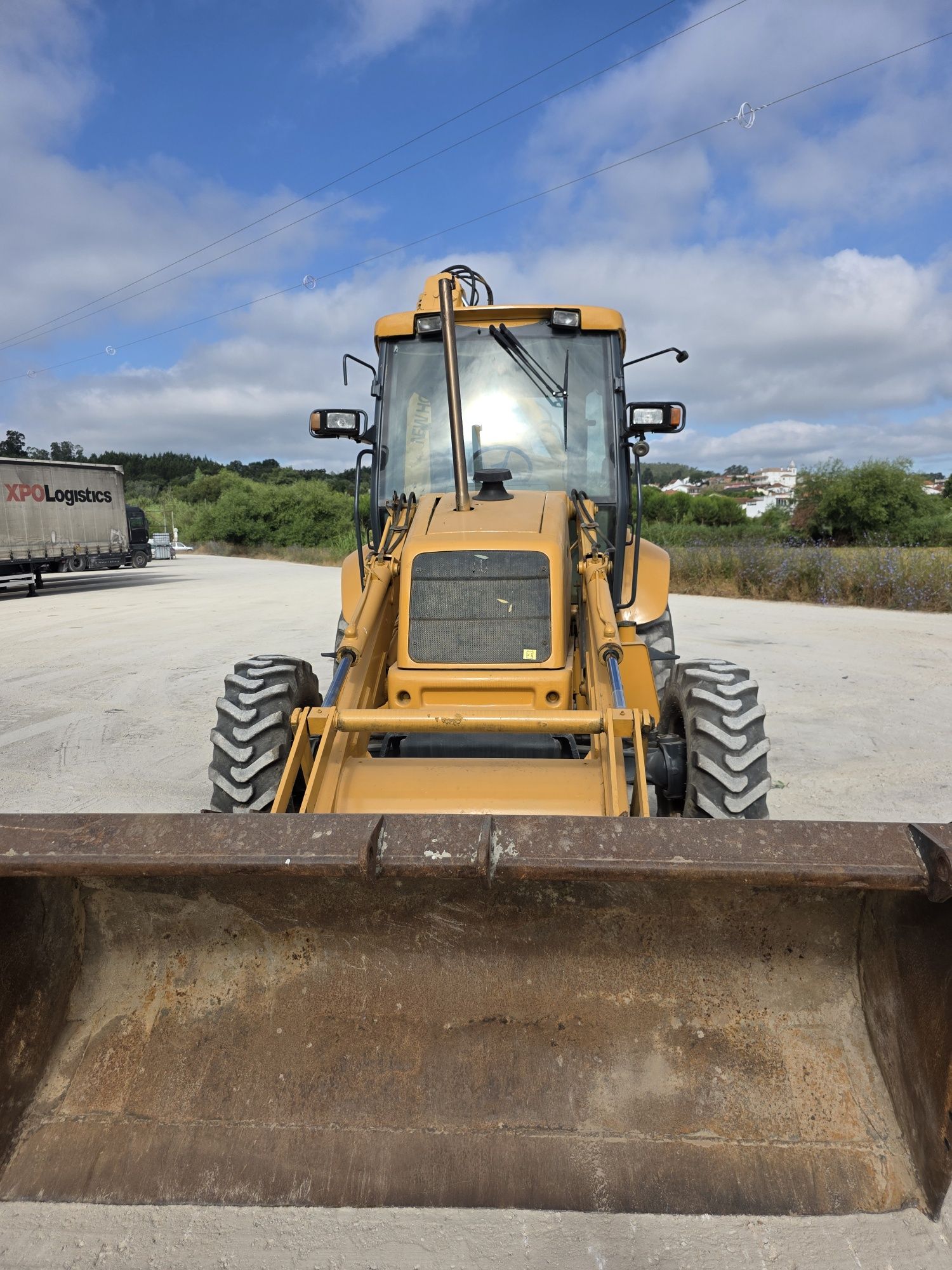 Retroescavadora New Holland NH95