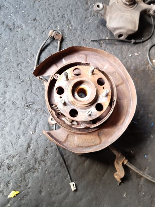 Поворотный кулак, цапфа, ступиця, супорт, диск, Туксон, КІА, KIA