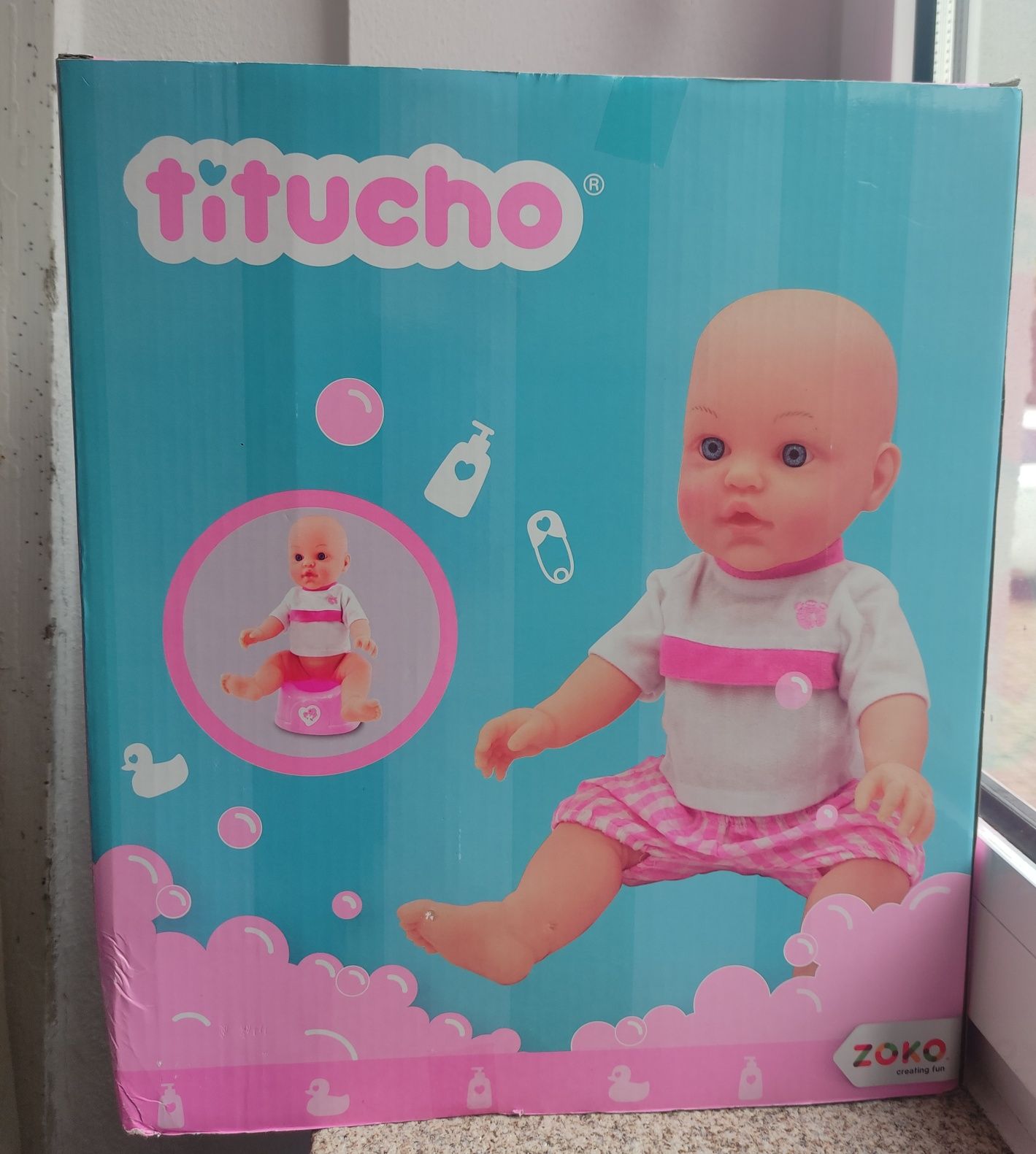 Boneca Titucho - bebe e faz chichi