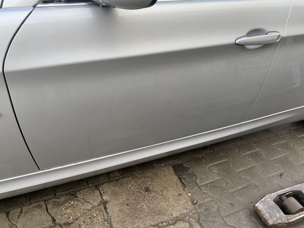 Drzwi lewe przód tył srebrne 354 europa demontaz BMW e90 e91 ori