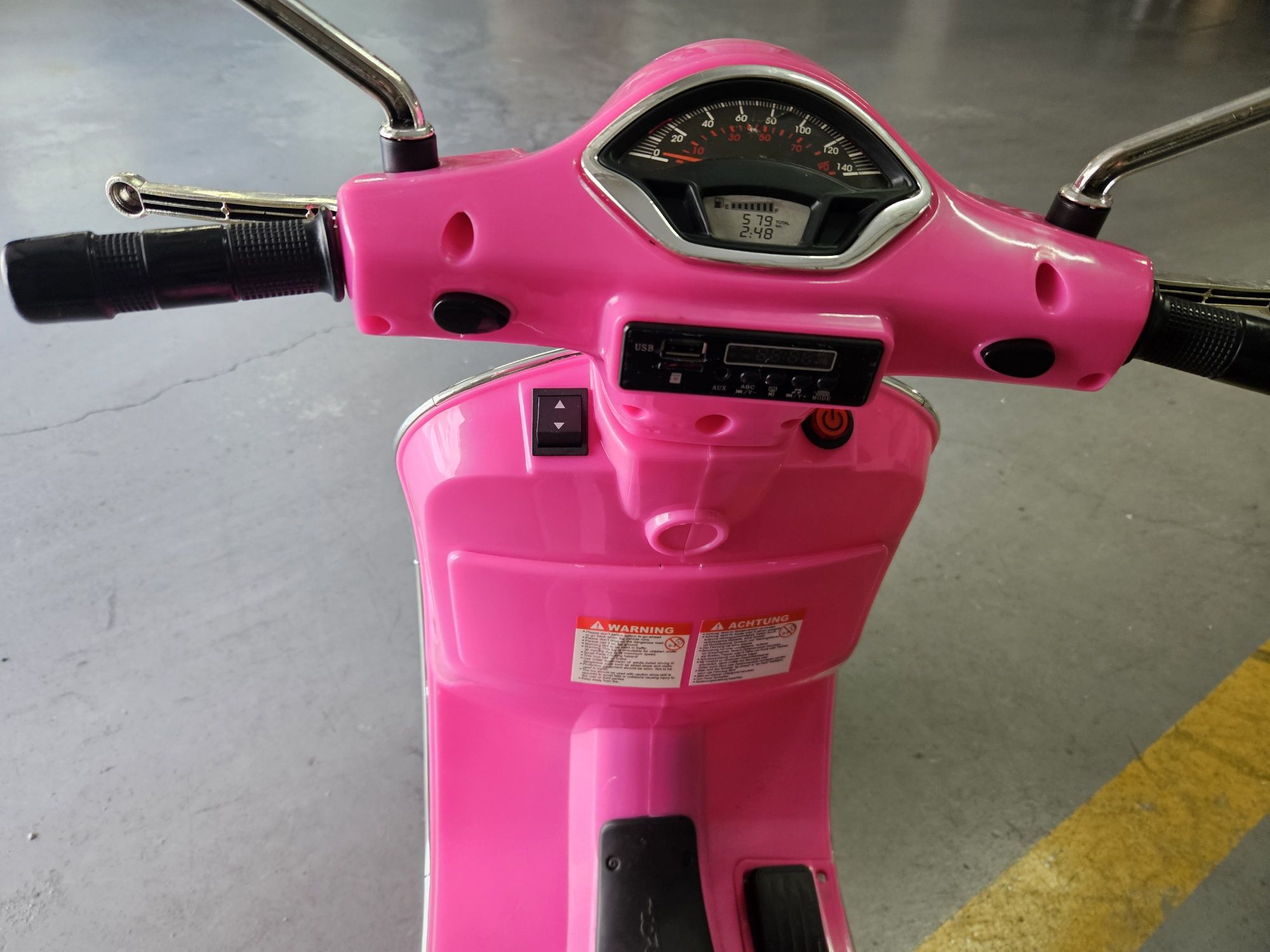 Vespa elétrica de Criança.