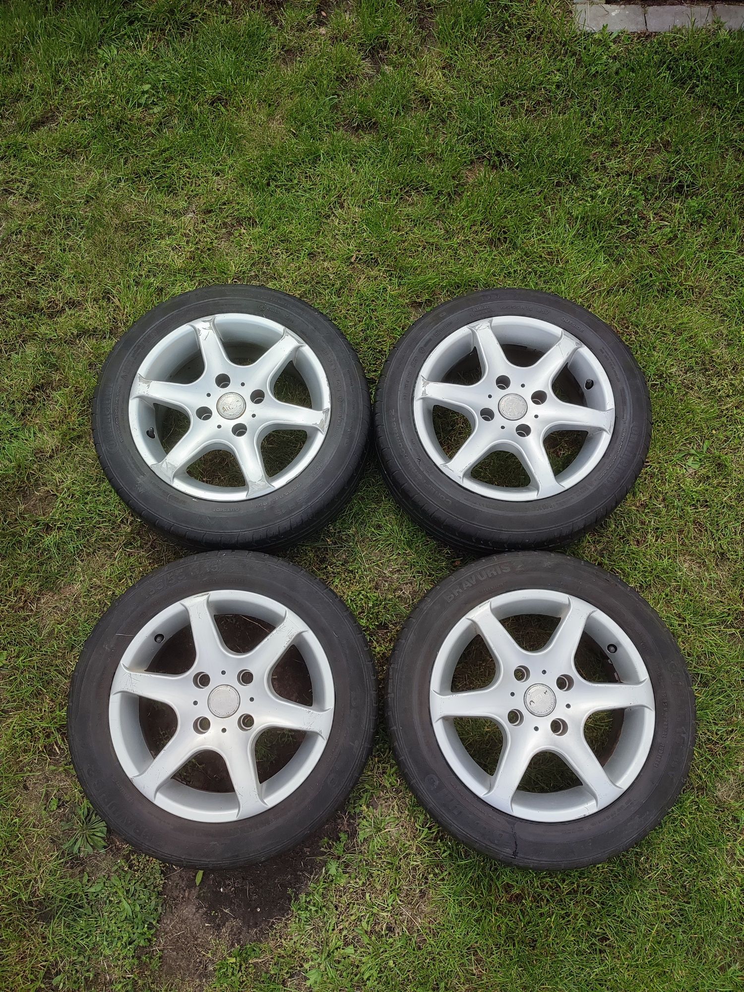 Felgi aluminiowe 15"  4x114  ET38  z oponami letnimi