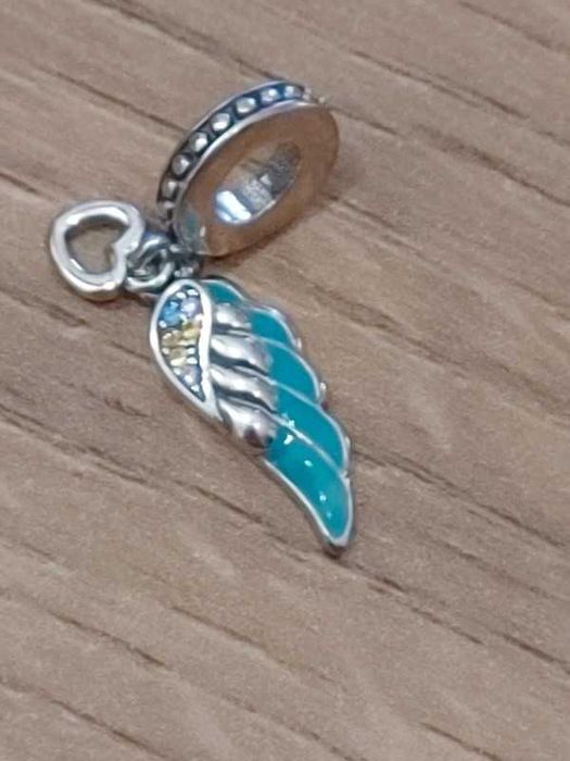 Charms pióro turkus