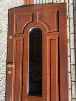 Piekne drewniane drzwi wejsciowe z lustrem weneckim