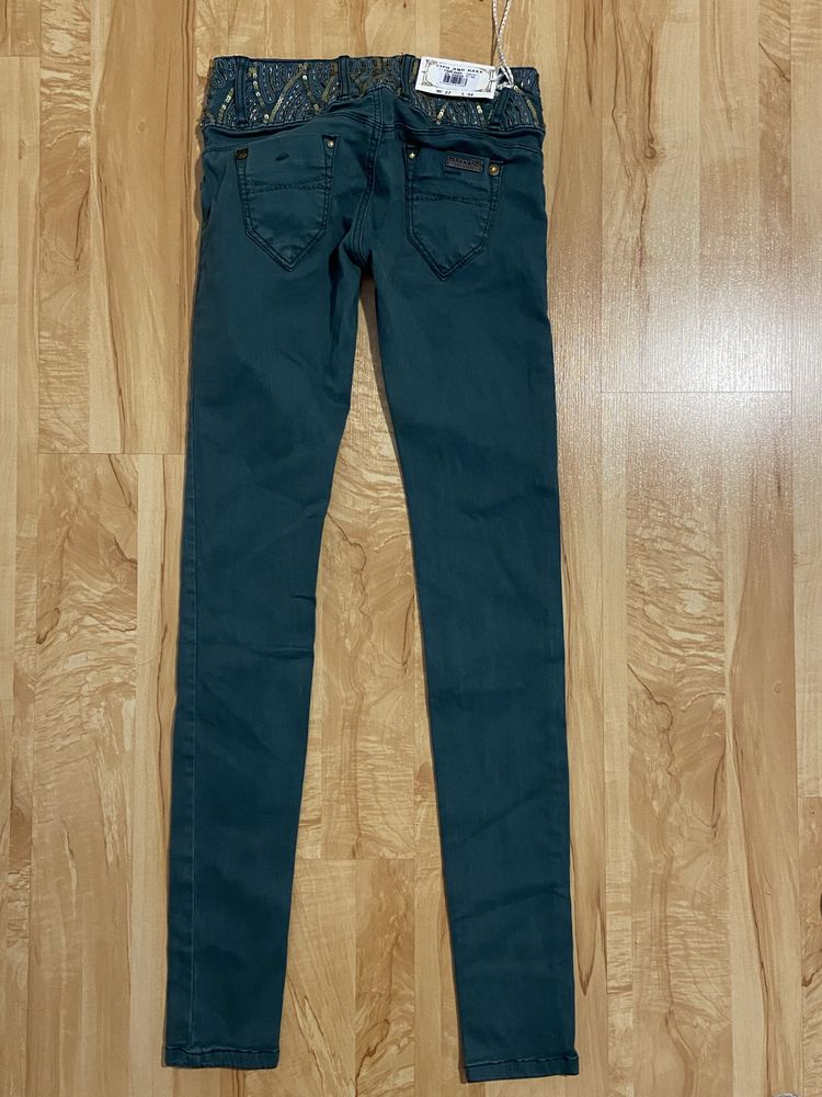 Cipo&baxx W27 L34 damskie spodnie skinny jeasny dżinsy zielone nowe