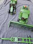 Bruder traktor John Deere z przyczepą