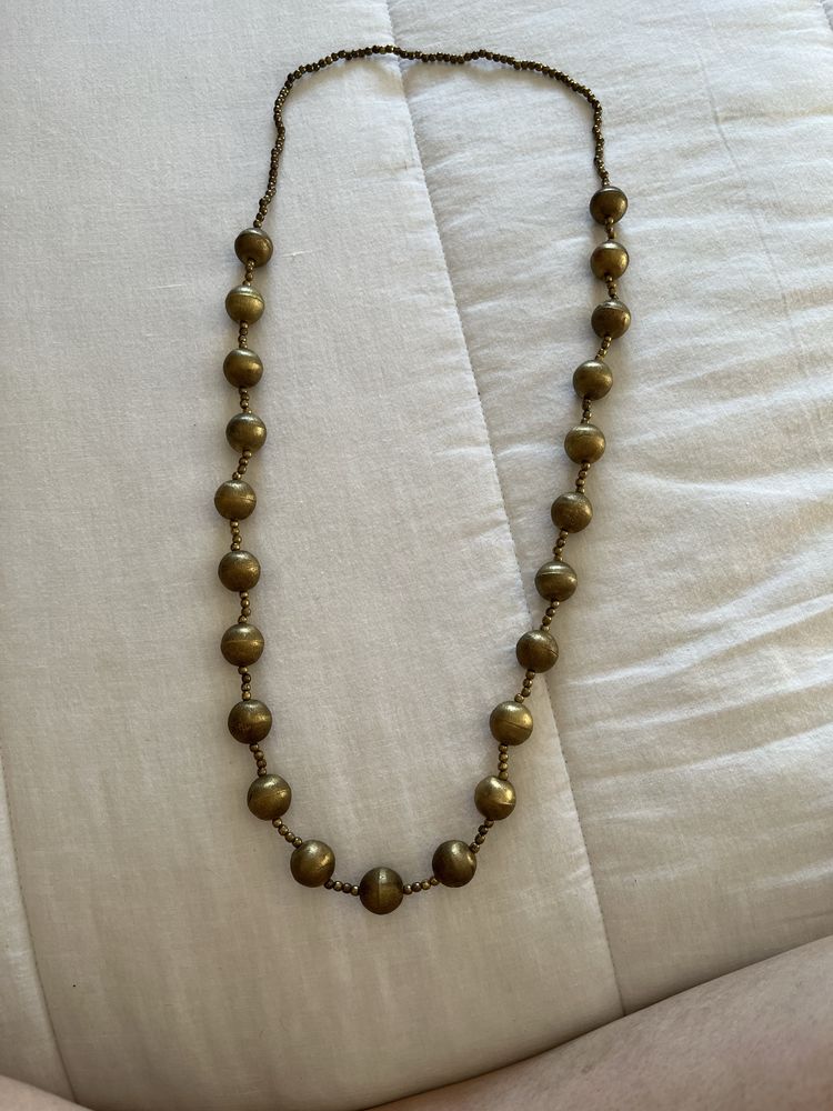 Fio dourado comprido