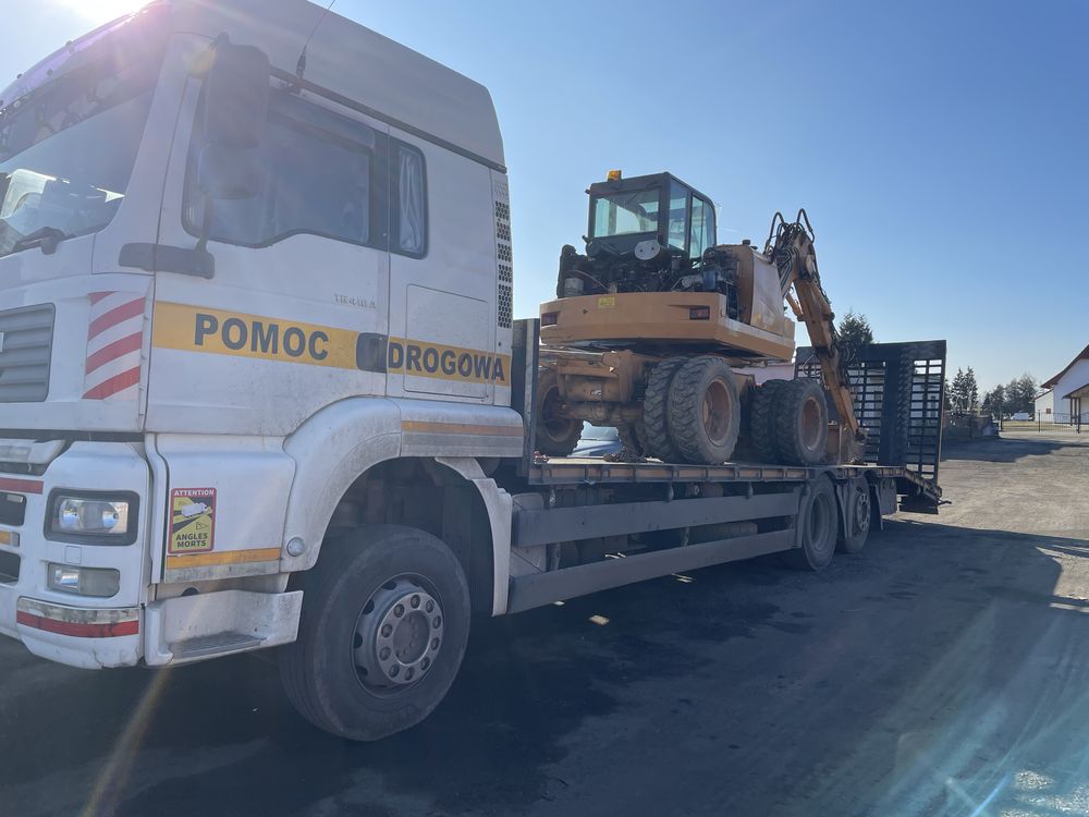 Pomoc drogowa Transport maszyn budowlanych i rolniczych laweta,holowni
