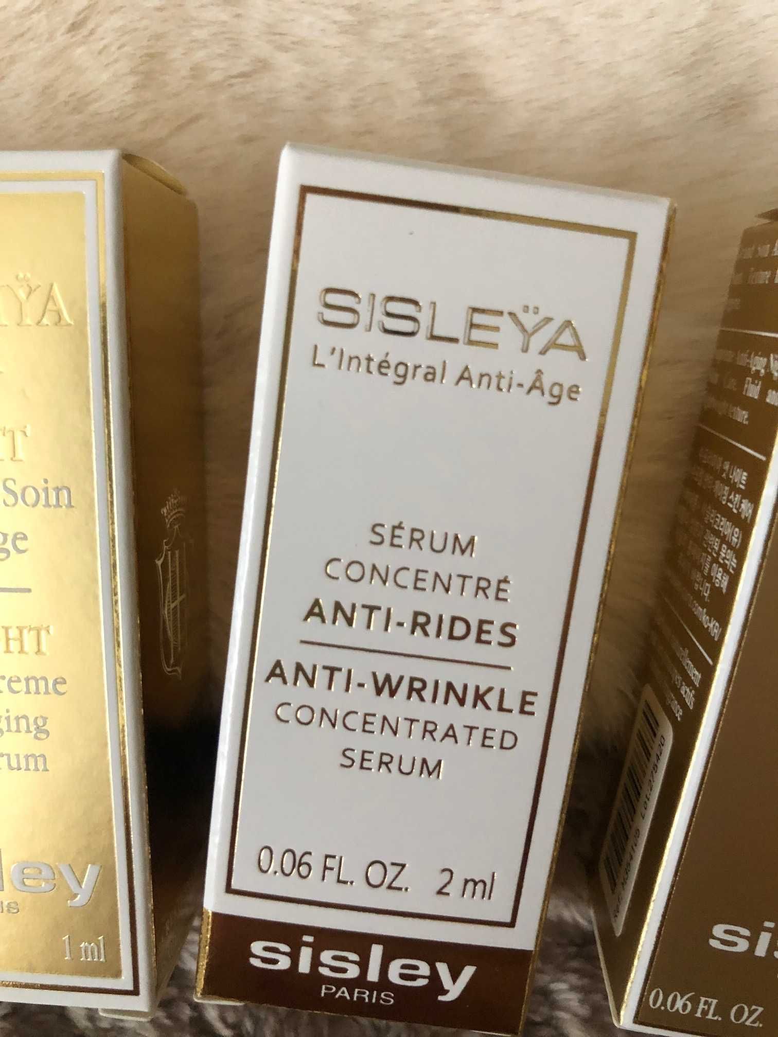 Sisley L’integral i Supremya - kosmetyki plus kosmetyczka.