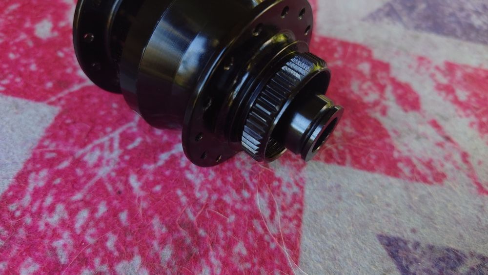 Динамовтулка під вісь 12x100 Shutter Precision PL-7 28H