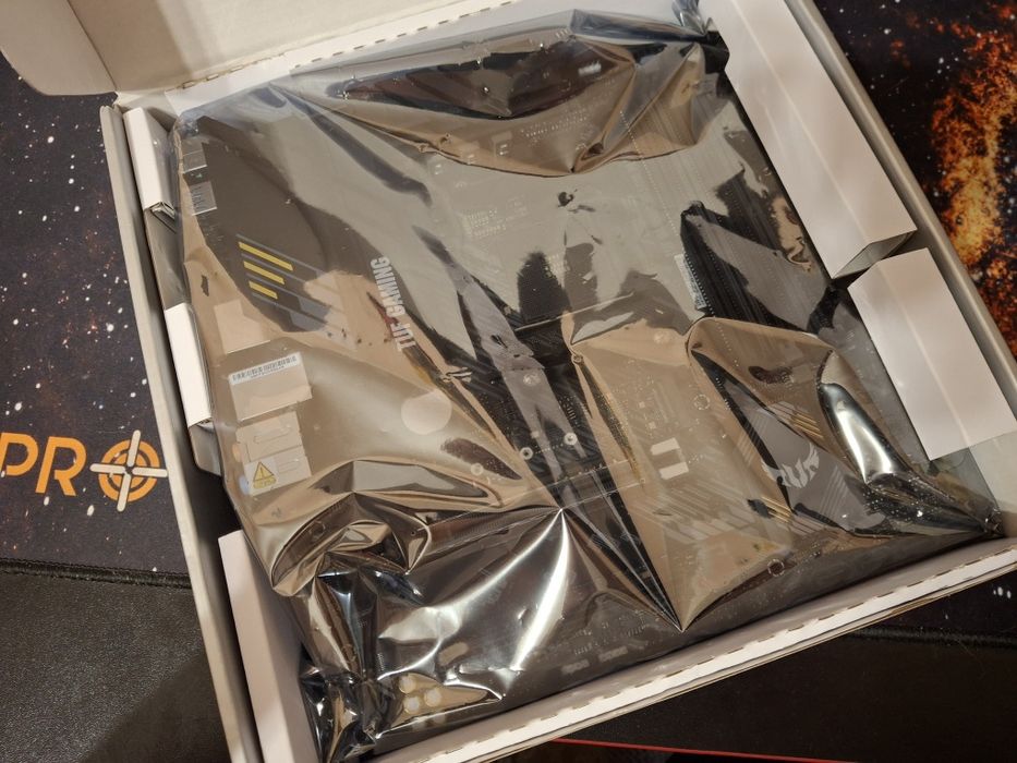 Материнська плата Asus TUF GAMING B550M-PLUS (sAM4, AMD B550)