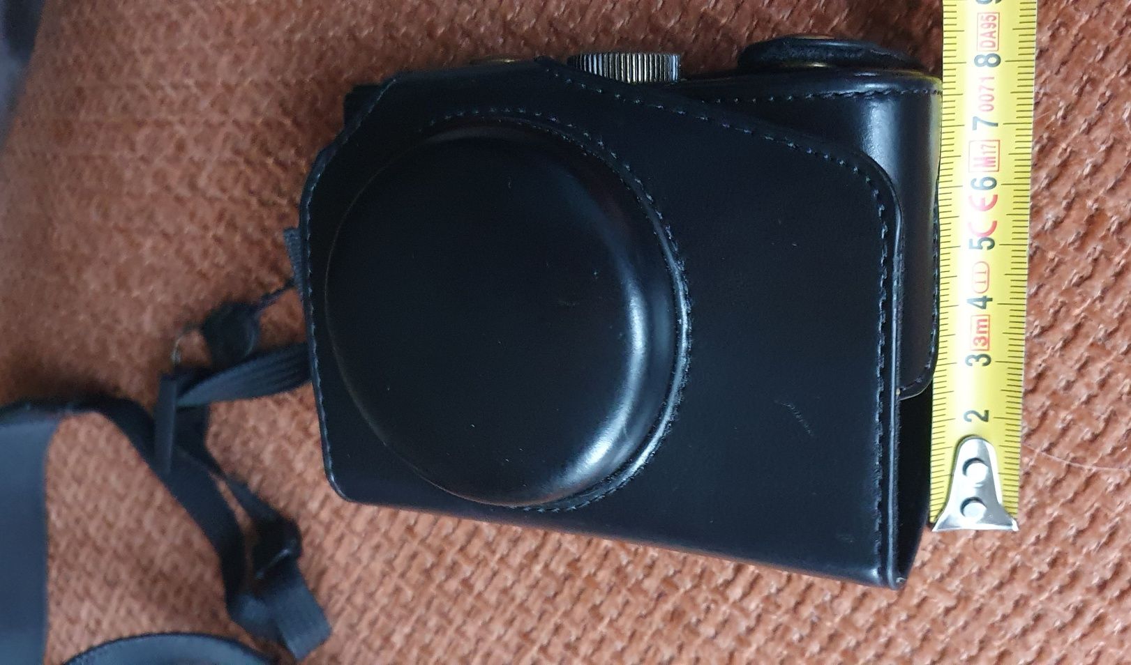 Etui Lumix 15 i inne że sobą po środku okazja