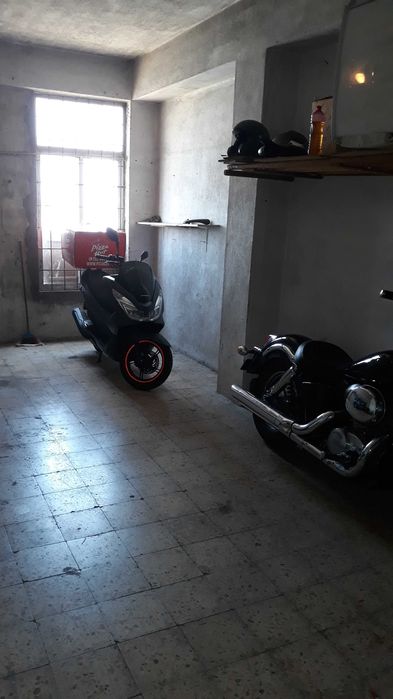 garagem para guardar moto