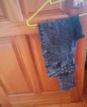 Calças cinzentas da Denim