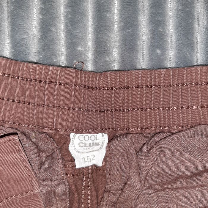 Eleganckie spodnie chłopiec r. 152 Smyk
