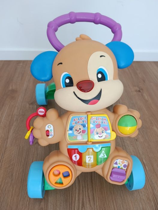 Andador cãozinho para criança Fisher Price  em bom estado a me