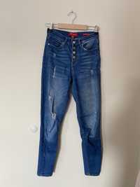 Jeansy spodnie dżinsowe z przetarciami GUESS XS