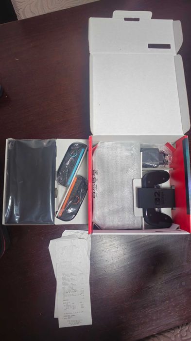 Nintendo switch 2 + conta 1 jogo pokem + sub 1 ano online + protecções